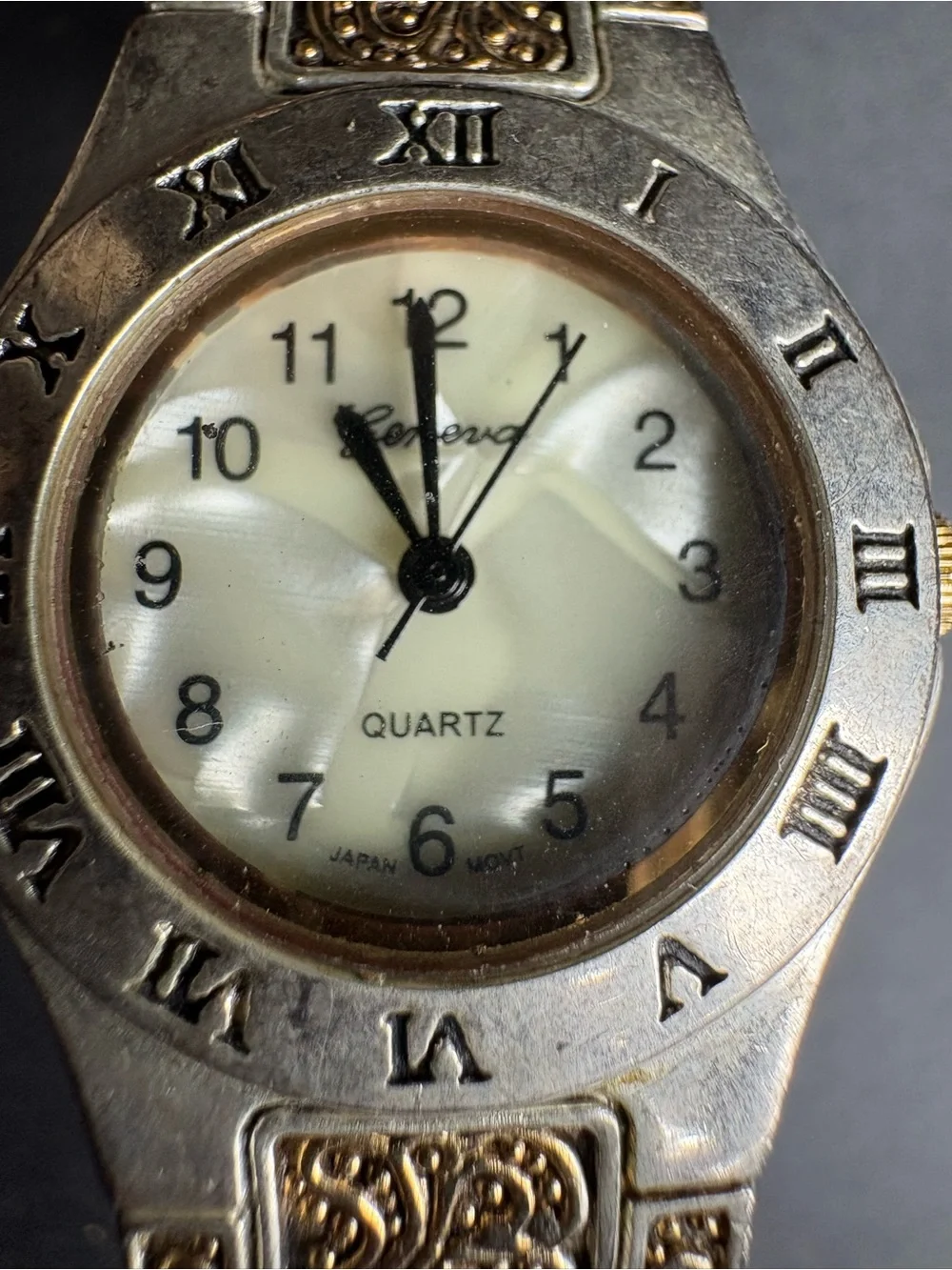 Ornient Women’s Silver-Tone Quartz Wristwatch with Roman Numerals